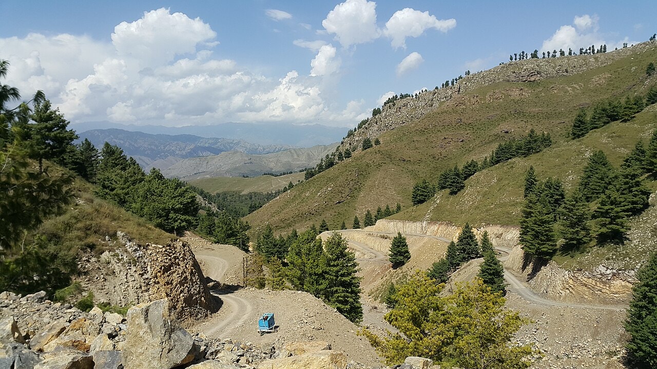 A green valley among mountains at the start of the Tirah valley.