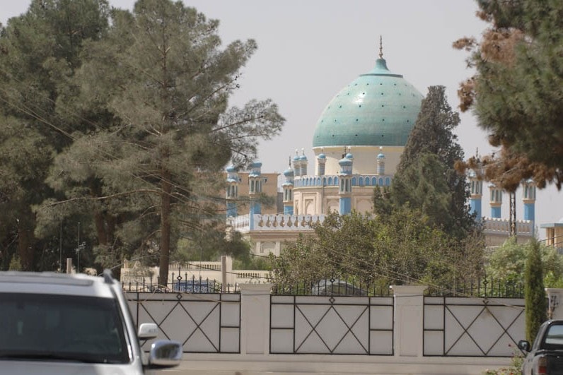 The Friday Mosque compound in Kandahar with a dome and minaret.