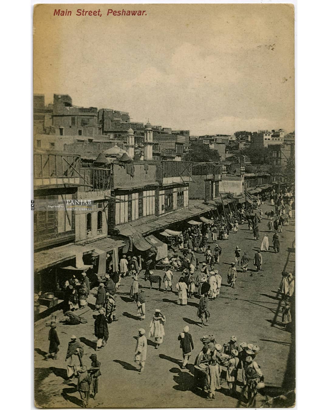 Early postcard of a busy street in Peshawar.