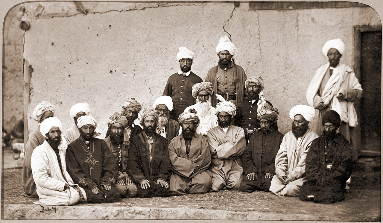 A group of Afghan chieftains seated outdoors at Kabul, photographed in 1879–80.