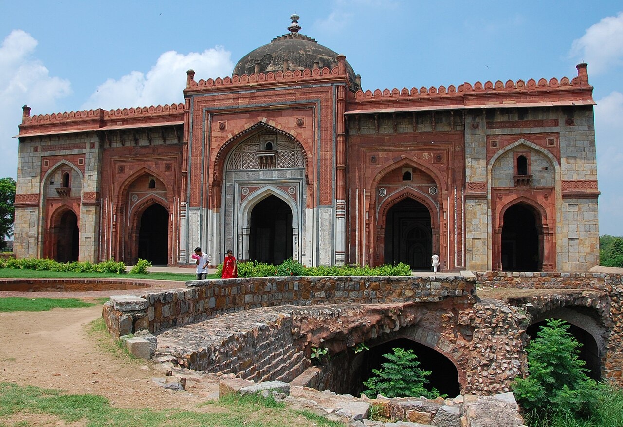 The red sandstone façade of the Qila-i-Kuhna mosque inside the Old Fort at Delhi.