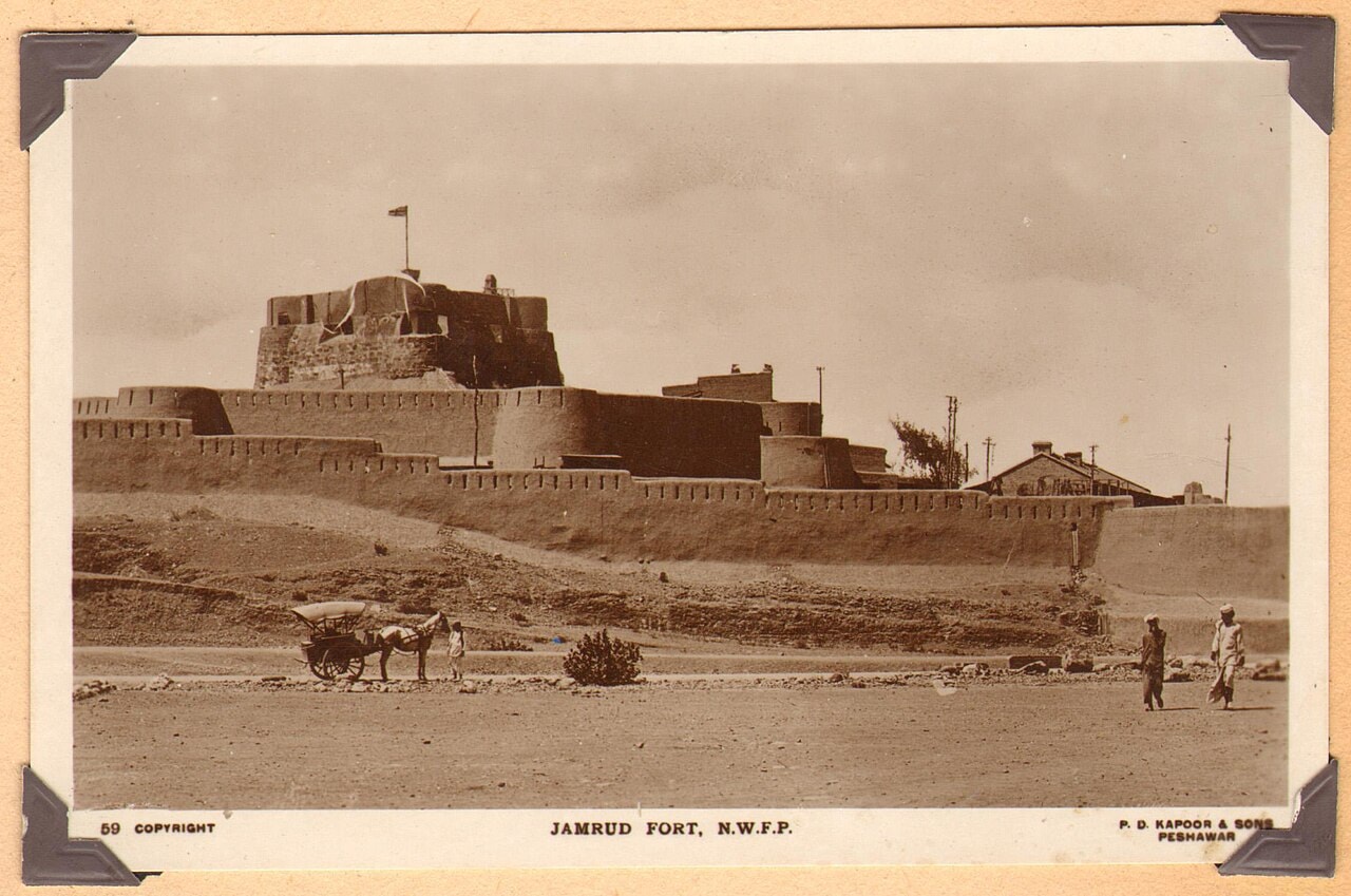A black-and-white photograph of the walls and towers of Jamrud fort.