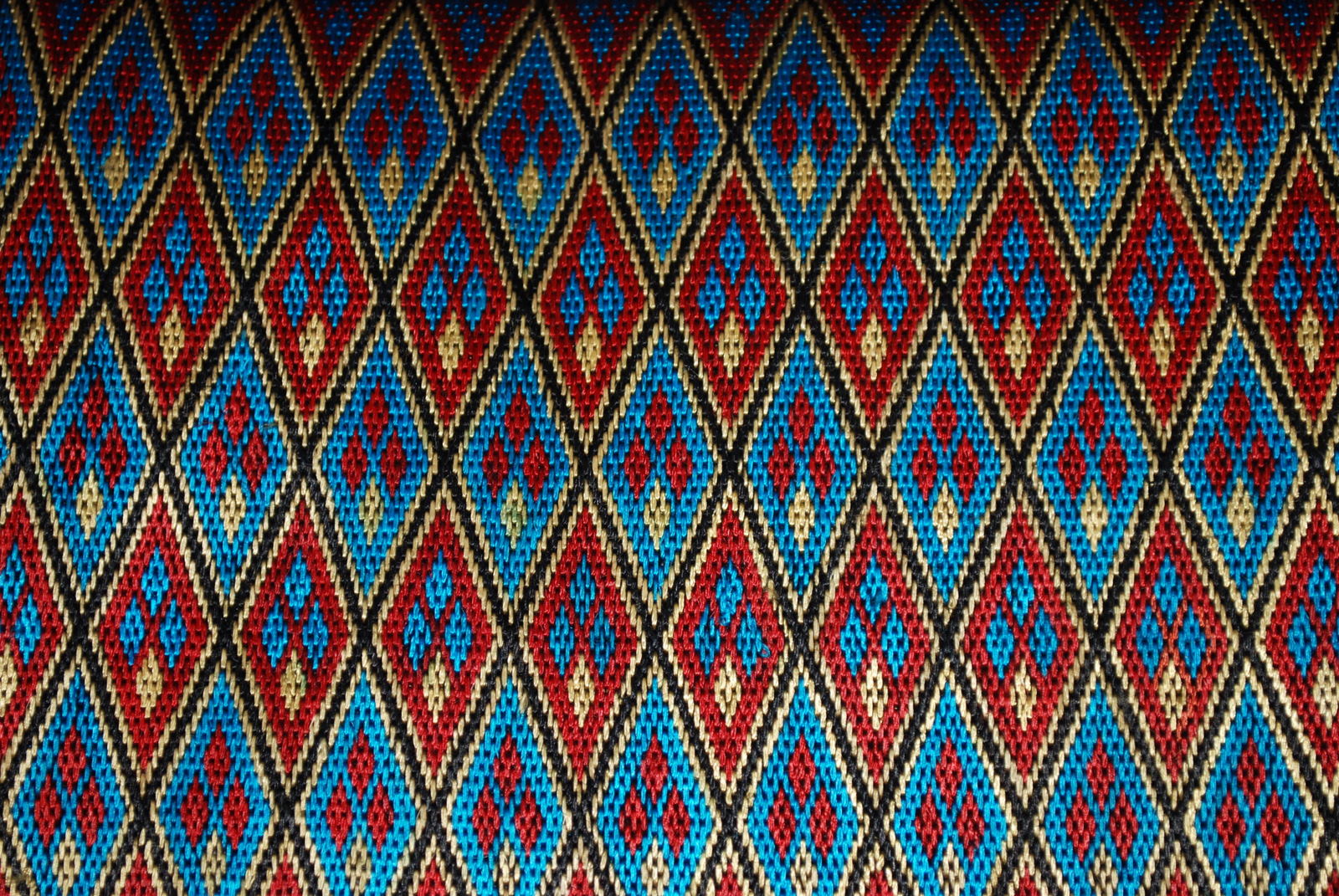 Close view of colorful Afghan embroidered textiles