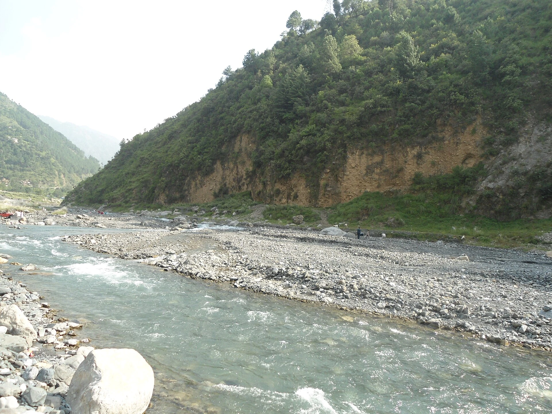 The Gomal river running through a rocky gorge between bare hills