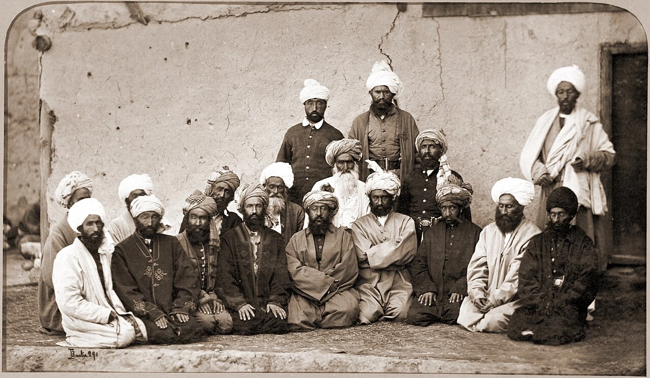 A group of Afghan chieftains seated outdoors at Kabul, photographed in 1879–80.