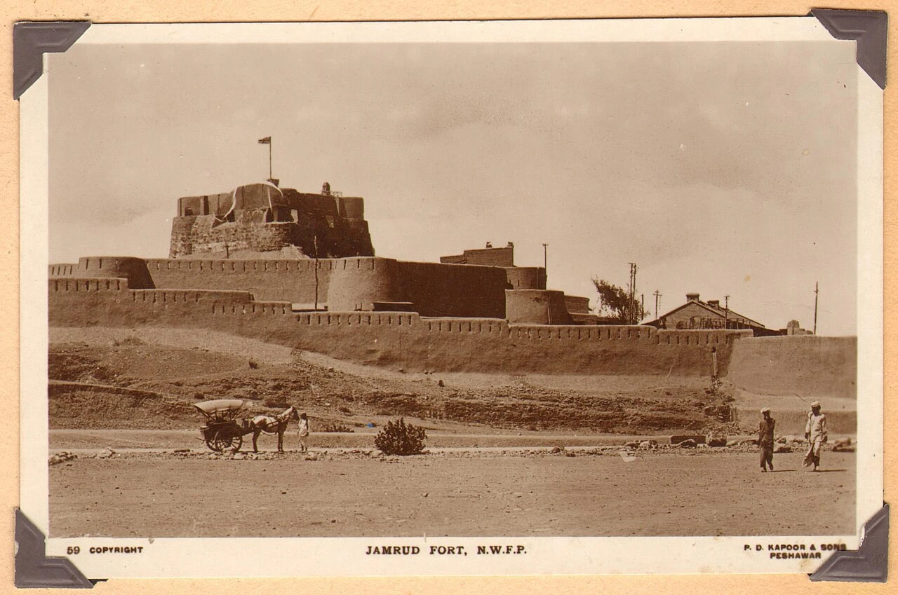 A black-and-white photograph of the walls and towers of Jamrud fort.